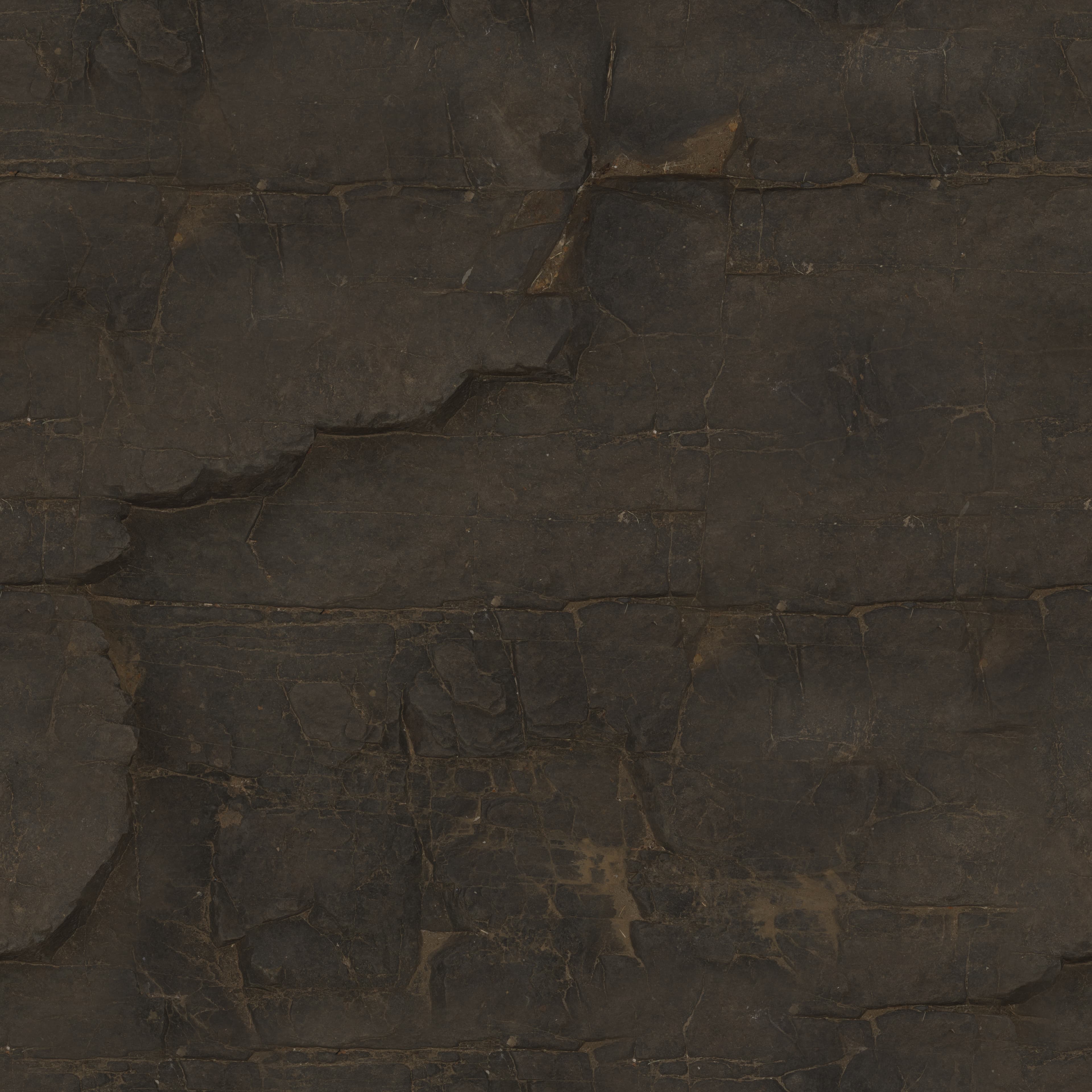 Dark fractured stone texture.